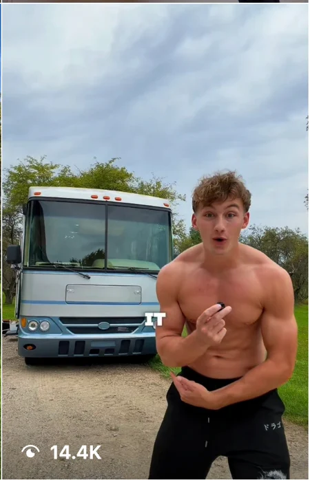 Adrian Fenske Instagram reel in front of an RV, 14.4 thousand views